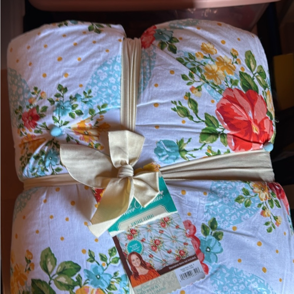 Floral Quilt with Red and Green Accents